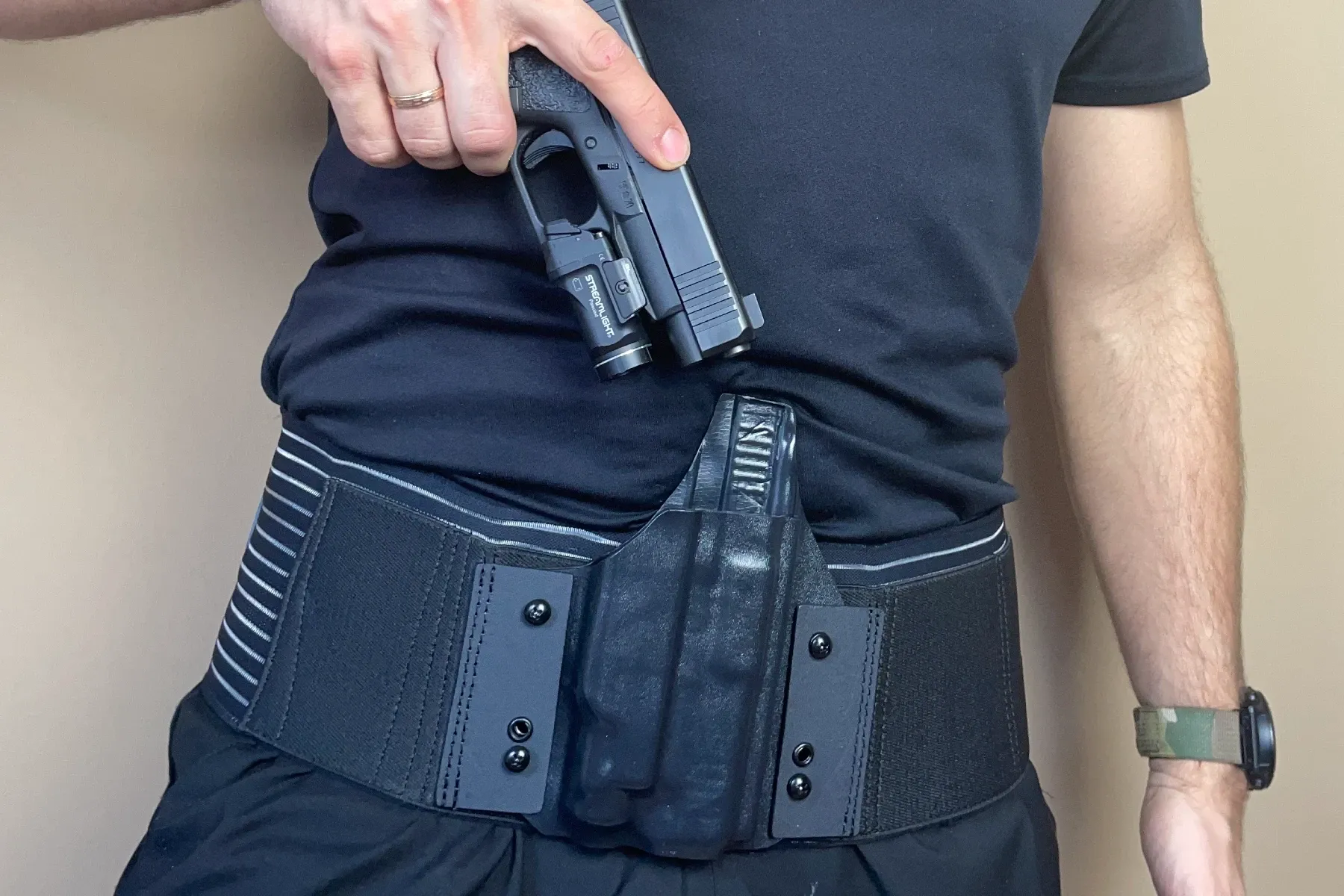 Light bearing appendix belly band holster