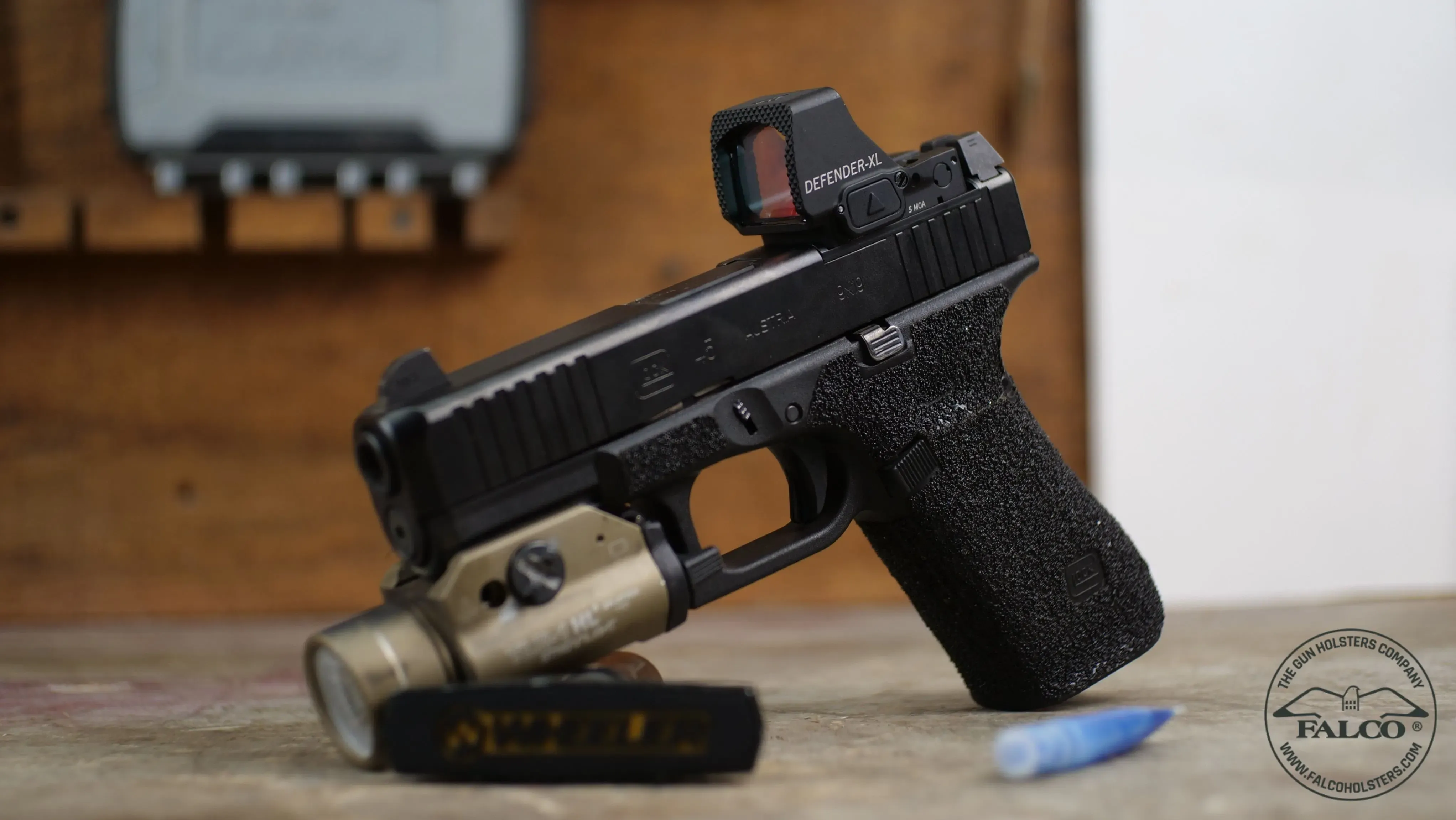 Glock equipped with the red dot sight