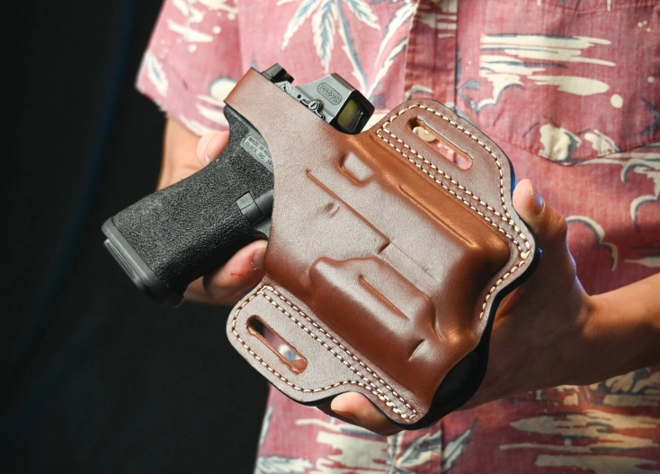 CONCEAL CARRY HOLSTERS FOR GUNS WITH LASER OR LIGHT
